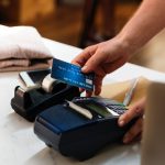 customer-using-card-to-make-purchase