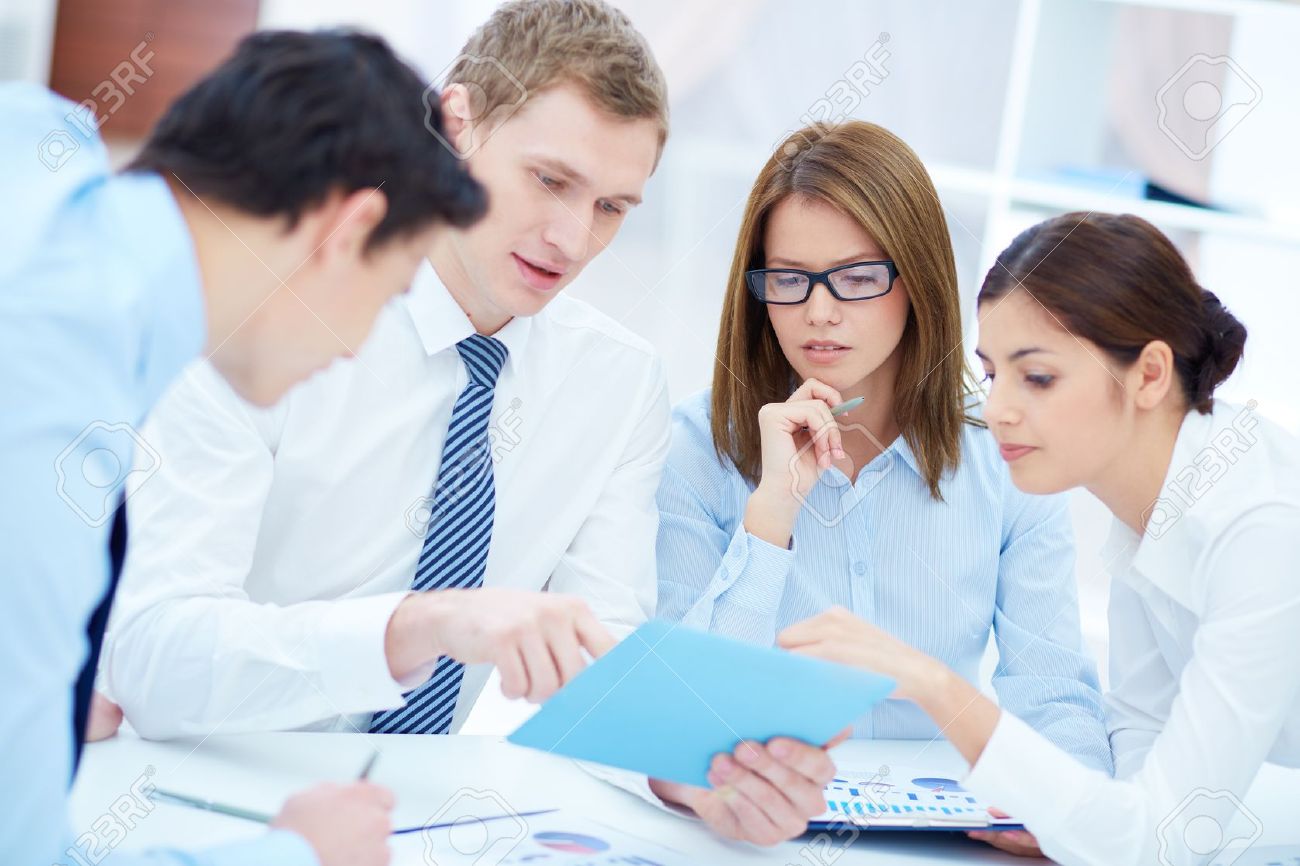 15978493-group-of-business-partners-interacting-while-planning-work-at-meeting-stock-photo.jpg 15978493-group-of-business-partners-interacting-while-planning-work-at-meeting-stock-photo.jpg